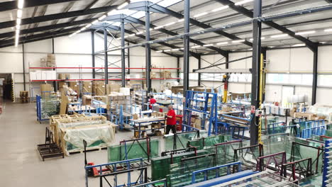 Manufacturing-workers-assembling-products-in-factory-storage-warehouse