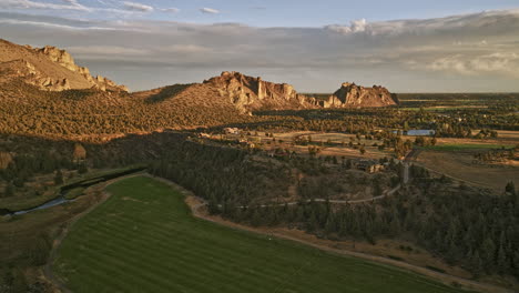 Terrebonne-Oregon-Aerial-v60-flyover-Sherwood-Canyon-along-Crooked-river-capturing-beautiful-ranch-mansions-surrounded-by-vast-farmlands-with-Smith-Rock-views---Shot-with-Mavic-3-Cine---August-2022