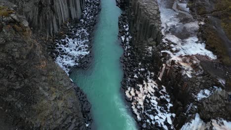 High-angle-aerial-over-Stuðlagil-Canyon-in-Winter