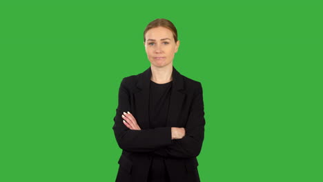 Business-Woman-Shaking-Head-No-Unimpressed-Wearing-A-Black-Suit-With-White-Studio-Background