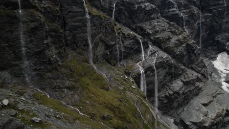 Drone-reveal-Earnslaw-glacier-over-waterfall