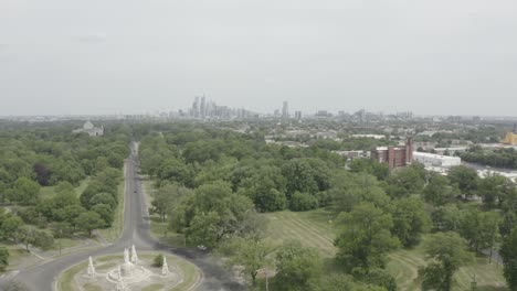 Philadelphia-Skyline-4K---Flying-Over-Trees