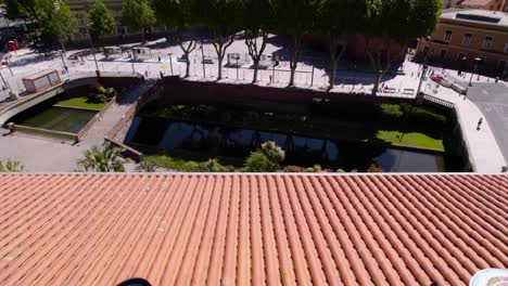 DJ-Playing-music-on-a-terrace-in-the-city-of-Perpignan-in-France