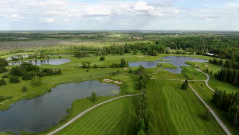 Aerial-view-of-lakes,-ponds-and-trees-at-an-Oakville-golf-course