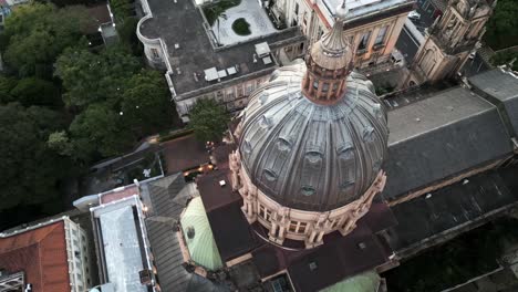 Aerial-view-descending-to-Porto-Alegre-Metropolitan-Cathedral-dome-in-downtown-Brazil-cityscape-Matriz-square