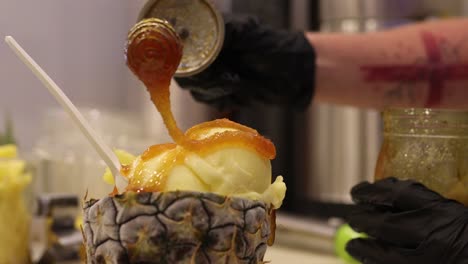 Fresh-Honey-Drizzle-Over-Pineapple-Ice-Cream-Served-On-A-Local-Farm-In-Hawaii