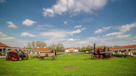 Old-equipment-and-historical-Pakruojis-manor-in-center,-time-lapse-view