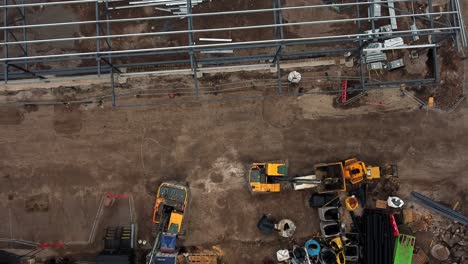 Aldi-Supermarkt-Baustelle,-Luftaufnahme,-Heranzoomen-In-Richtung-Bulldozer