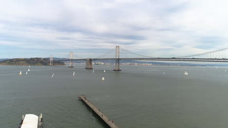 Bay-bridge-in-San-Francisco-with-sailboats