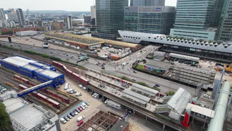 Poplar-DLR-station-Canary-Wharf-financial-district-London-UK-drone-aerial