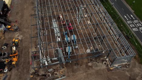 ALDI-supermarket-construction-building-site-aerial-view-industrial-metalwork-development,-UK