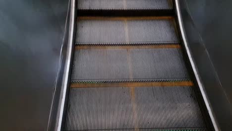 isolated-moving-escalator-going-up-from-top-angle-at-morning-video-is-taken-at-new-delhi-metro-station-new-delhi-india-on-Apr-10-2022