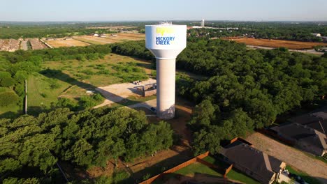 Aerial-footage-of-water-tower-in-Hickory-Creek-Texas