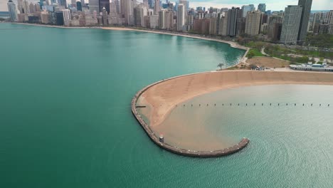 Aerial-of-North-Avenue-Beach-Pier-Descent,-Chicago,-Illinois---Drone-4k