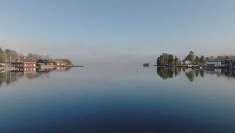 Flat-calm-morning-over-Greenville-Cove-towards-Moosehead-Lake