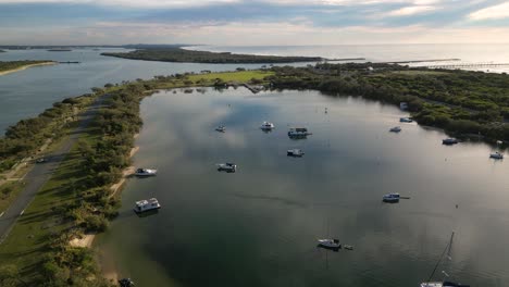 Aerial-over-boats-parked-at-The-Spit-and-Doug-Jennings-Park-on-the-Broadwater-on-the-Northern-end-of-the-Gold-Coast,-Queensland,-Australia-20230502