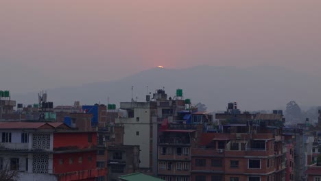 Zooming-in-clip-of-city-scape-of-Kathmandu,-Nepal-at-sunset