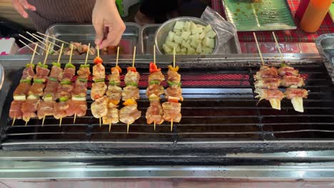Grilled-skewers,-is-a-popular-street-food-in-Bangkok,-Thailand