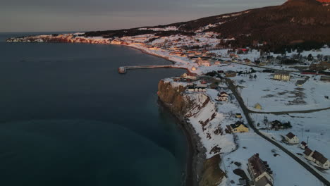 Perce-village-by-drone-in-the-spring-when-there-is-still-some-snow-on-the-ground