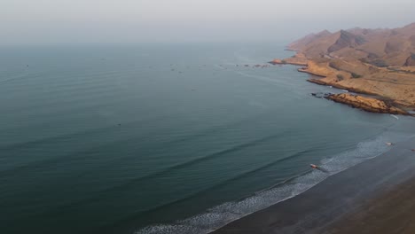Aerial-drone-panning-shot-over-Kund-Malir-Beach-beside-Ormara-Hingol-national-park-in-Balochistan-during-evening-time