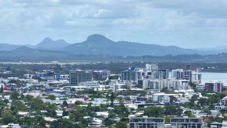 Telephoto-Drone-View-Of-Maroochydore-Town-And-Mountain-View,-Aerial-Parallax-4K-Australia