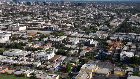 Aerial-View-of-Hollywood-Neighborhood-of-Los-Angeles-CA-USA,-Buildings-and-Streets-on-Sunny-Day,-Drone-Shot