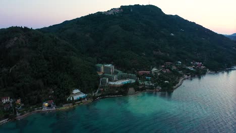 Aerial-view-of-the-Greek-island-of-Corfu's-beachfront-hotel-complex,-Mythos-Palace