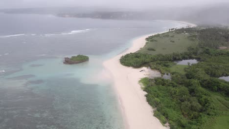 Pantai-Marosi-with-No-people-at-Sumba-island-with-low-clouds-in-the-background,-aerial