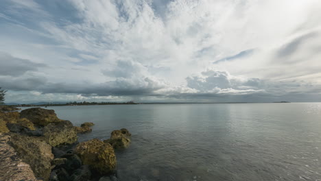 Vast-sky-sea-and-cloudscape-offshore-of-Isla-de-Cabras-National-Historic-Site,-San-Juan,-Puerto-Rico---Timelapse