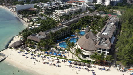 Luxurious-hotel-resort-with-swimming-pools-on-sand-beach-in-Mexico