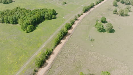 Aerial-Tilt-up-On-Field-Landscape-In-Leach,-Oklahoma,-USA