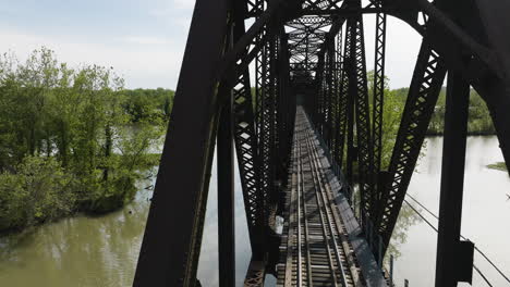 Railroad-Bridge-Over-Lee-Creek-In-Van-Buren,-Arkansas,-United-States---drone-shot