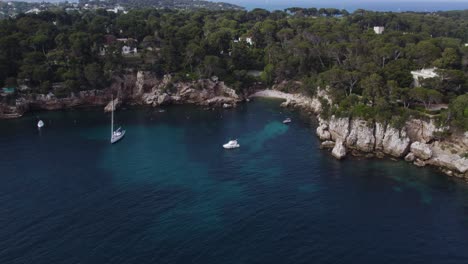 Tropical-Lagoon-Cove-on-Antibes,-South-of-France-Coastline---Aerial