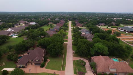 Aerial-footage-of-a-neighborhood-in-Flower-Mound-Texas-flying-north-over-Trotter-Ln