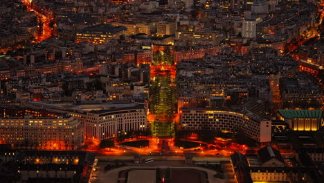 Glowing-Cityscape-At-Night-In-The-City-Of-Paris-France-Seen-From-The-Eiffel-Tower