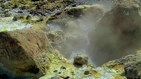 Slow-motion-footage-of-hot-springs,-steaming-fumaroles-and-boiling-mud-pots-in-Seltun-Geothermal-Area-in-Iceland