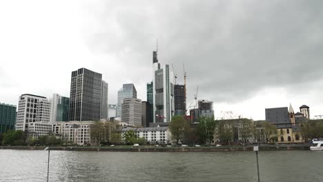 Slow-motion-Frankfurt-financial-district-skyline-across-main-river