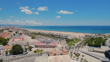 Aerial-view-of-the-Malvarrosa-beach,-and-the-Cabanyal-neighborhood-in-the-city-of-Valencia,-Spain