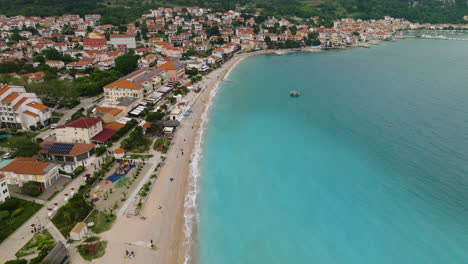 Aerial-Drone-View-The-Famous-Holiday-Resort-Town-Of-Baska-On-Krk-Island,-Croatia