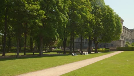 Shot-of-lush-green-Parc-du-Cinquantenaire-or-Park-of-the-Fiftieth-Anniversary-or-Jubelpark-or-Jubilee-Park-situated-in-Brussels,-Belgium-on-a-bright-sunny-day