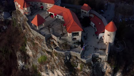 Aerial-Ascending-Birds-Eye-Shot-Over-Lake-Bled-Castle
