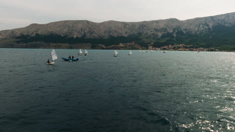 Aerial-View-Of-Sailing-Yacht-Regatta-In-Baska,-Krk,-Croatia---drone-shot