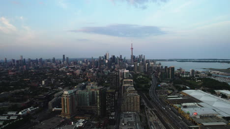 Aerial-view-of-the-Exhibition-Place-with-Toronto-skyline-background,-sunrise-in-Canada