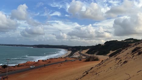Landscape-shot-of-the-famous-Cacimbinhas-Cliffs-of-the-tropical-Northeastern-Brazil-coastline-near-the-tourist-beach-town-of-Pipa,-Brazil-in-Rio-Grande-do-Norte-during-a-warm-sunny-summer-day