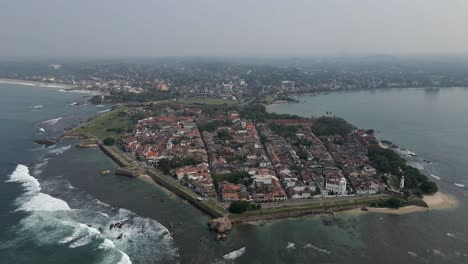 Aerial-pan-across-old-Dutch-Galle-Fort-on-coastal-point-in-Sri-Lanka