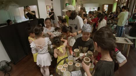 Kids-interactive-educational-activity-event-in-cafe.-China