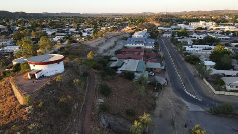 Drone-aerial-of-Mount-Isa-town-with-a-slow-pan-during-sunrise