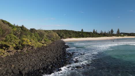 Scenic-view-of-the-Fingal-Heads-basalt-rock-formations-and-secluded-beach-area