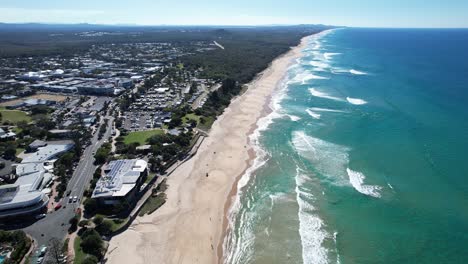 Blue-Ocean-Waves-And-Sandy-Shore-Of-Coolum-Beach-In-Queensland,-Australia---aerial-panoramic