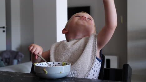 Cute-Toddler-Boy-Eating-Meal-Independently,-Static-Close-Up